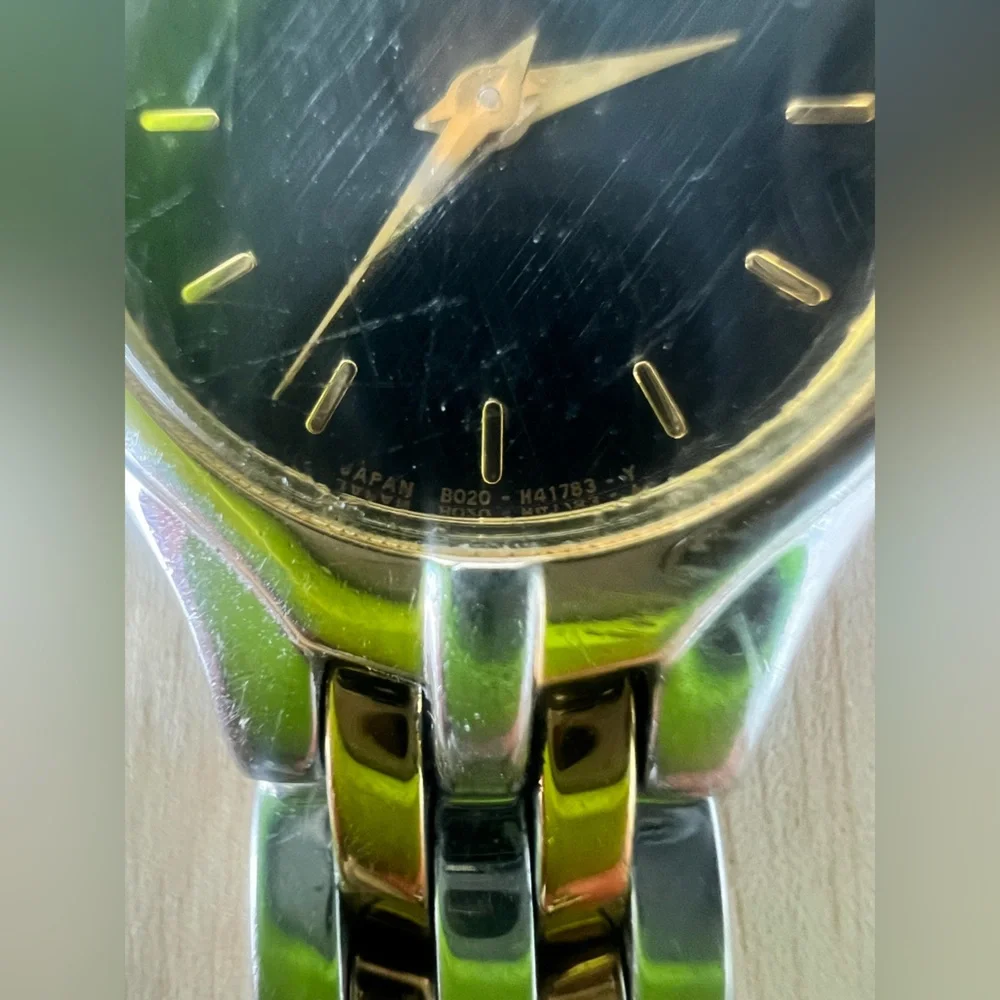 Citizen eco-drive ladies black dial two toned solar dress watch